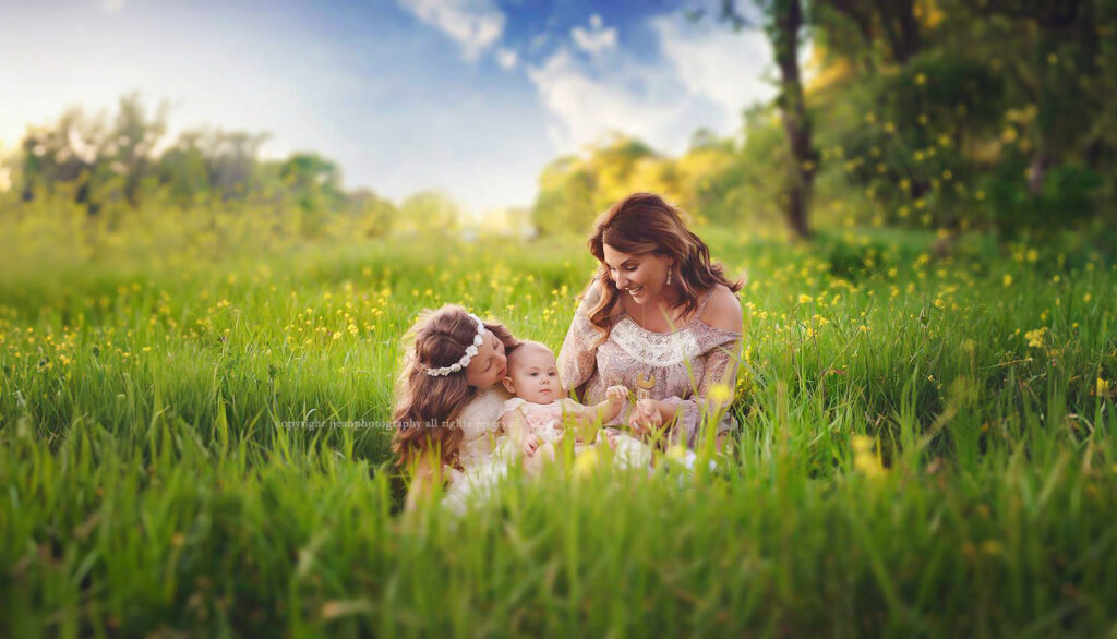 colorful spring family portrait in field