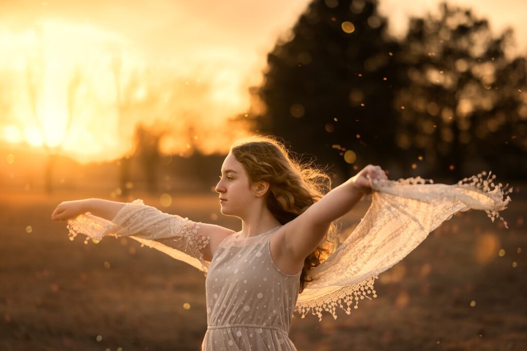 young woman portrait sunset