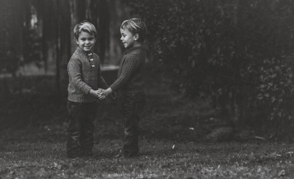 brothers holding hands