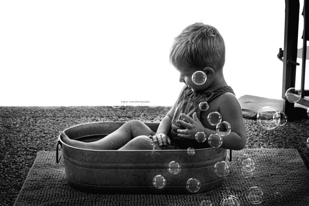 toddler with bubbles