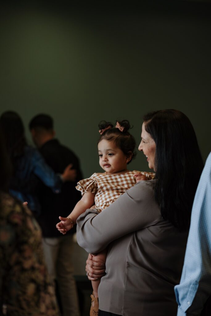 mom holding toddler