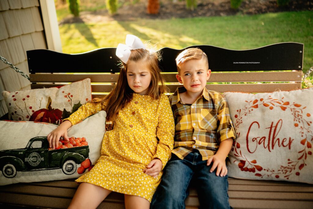 siblings making silly faces