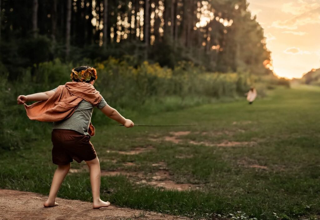 boy imagination outside