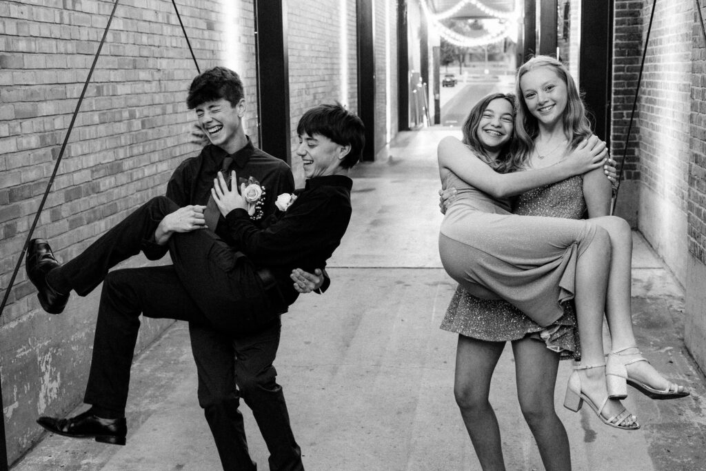 homecoming couple acting goofy and laughing
