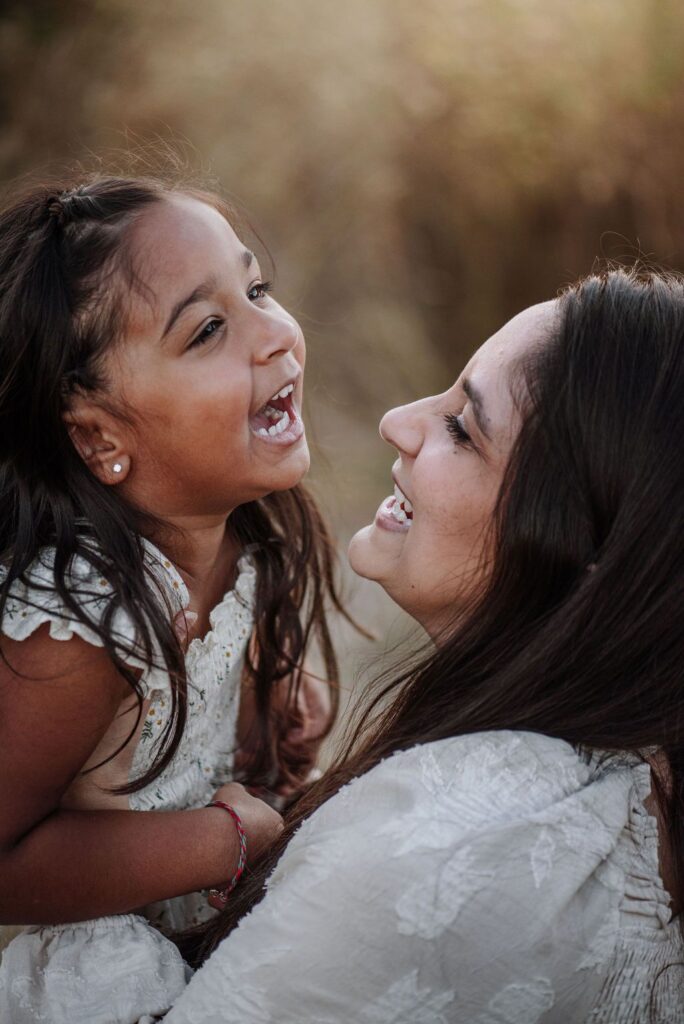 mother daughter laughing