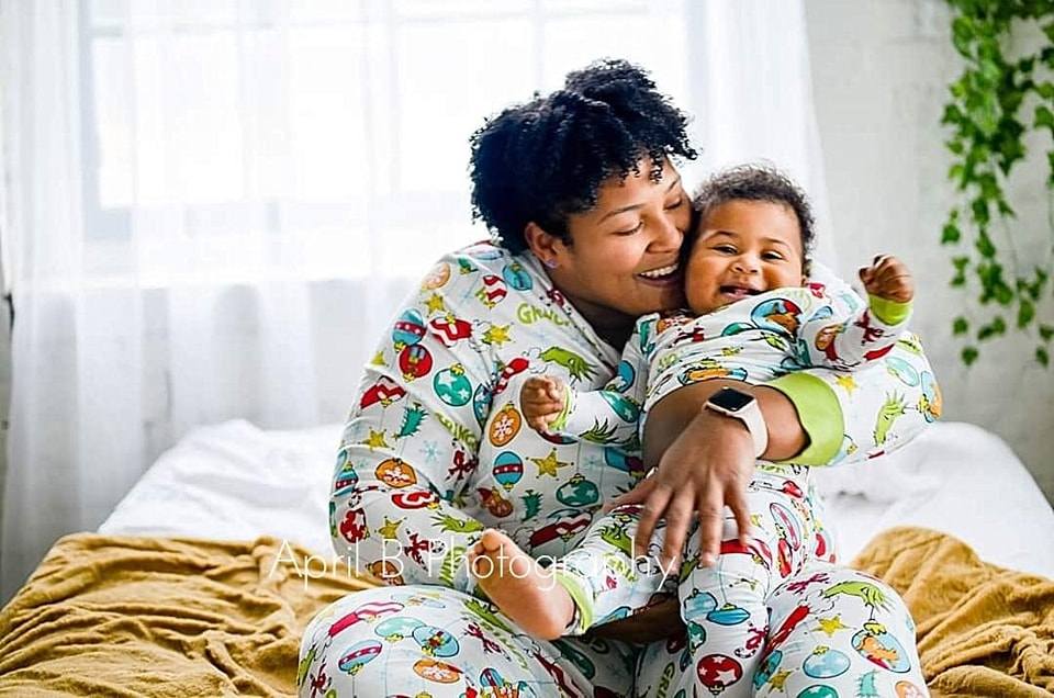mother and baby laughing