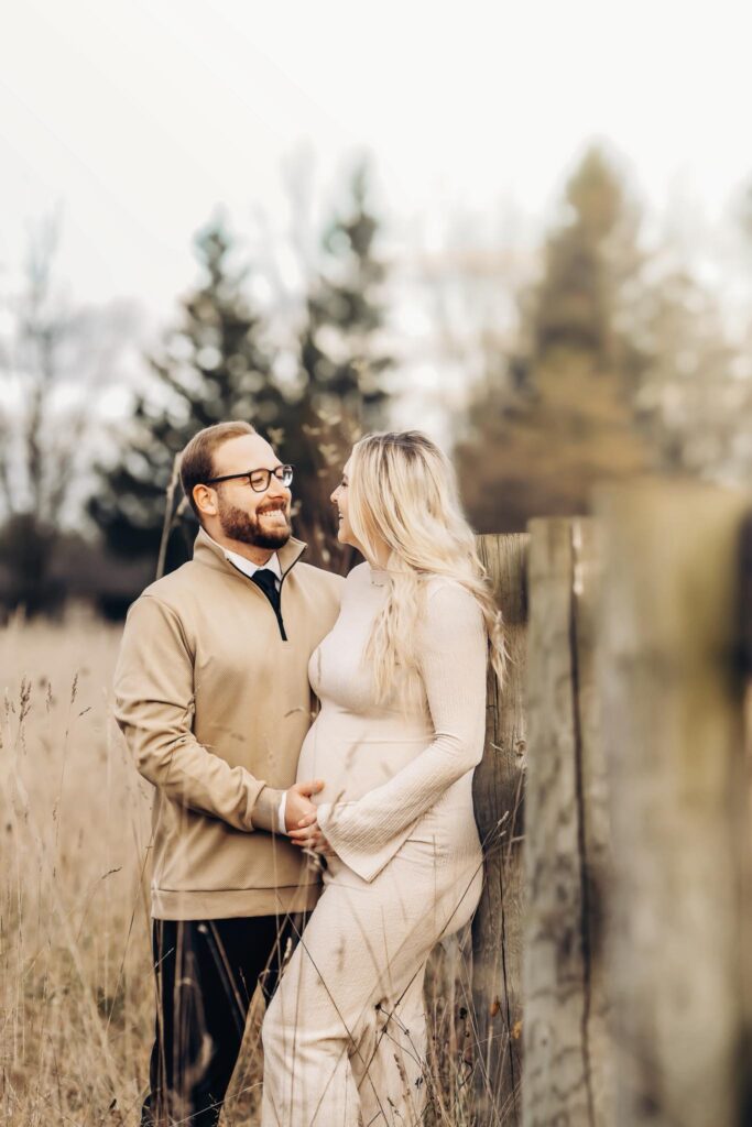 maternity session - couple gazing at each other