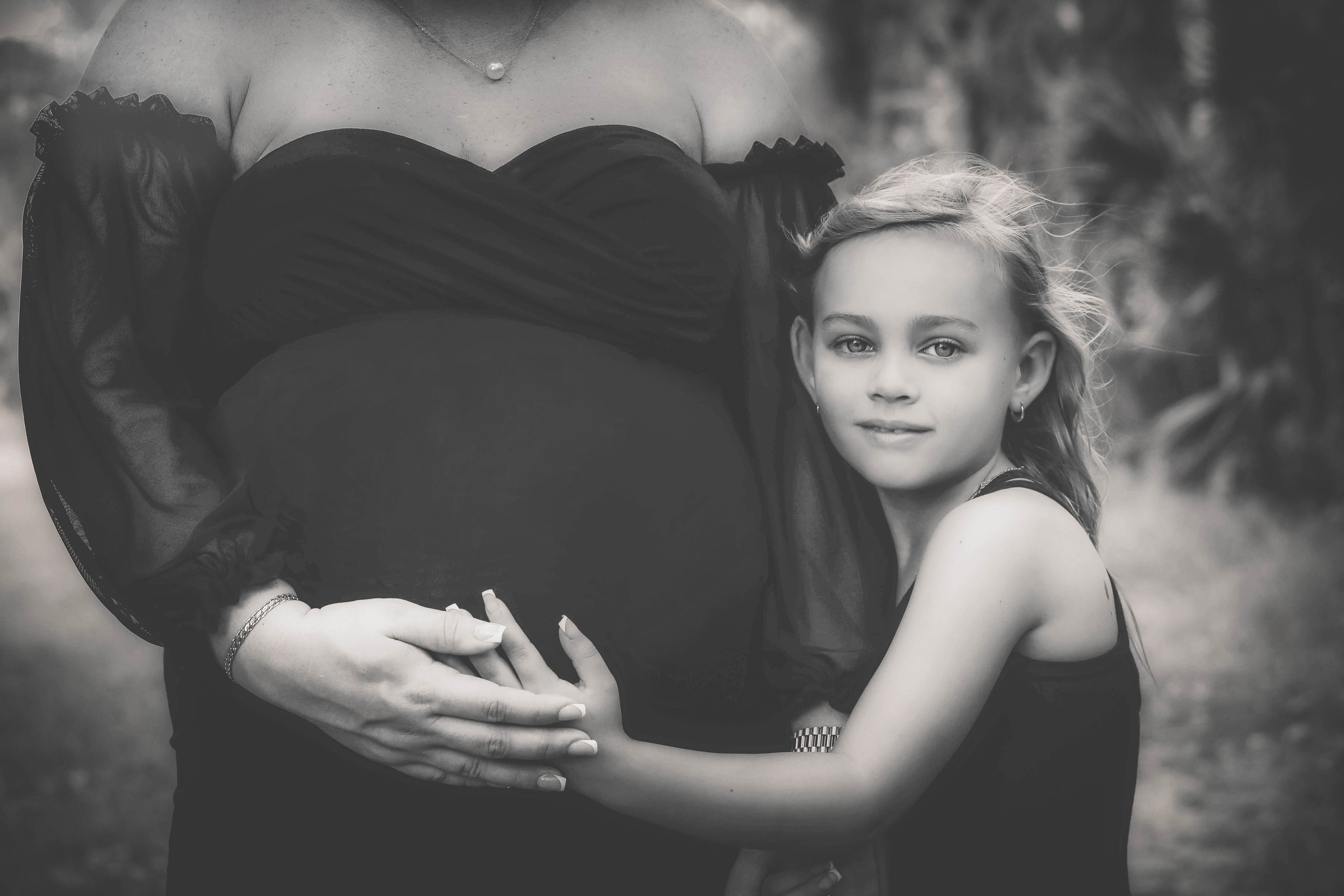 Maternity capture of pregnant mom with daughter