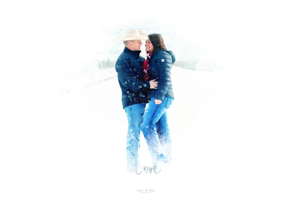 couple laughing in the snow